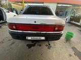 Mazda 323 1994 годаүшін950 000 тг. в Шамалган – фото 2