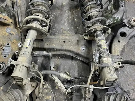 В наличии привозной стойки на Mazda CX-7 2.3л Турбо передний за 25 000 тг. в Астана