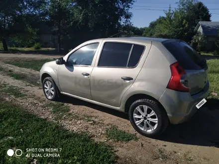 Renault Sandero 2014 года за 2 700 000 тг. в Уральск – фото 4