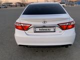 Toyota Camry 2015 года за 9 000 000 тг. в Кульсары – фото 4