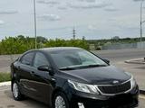 Kia Rio 2013 года за 4 600 000 тг. в Караганда – фото 2