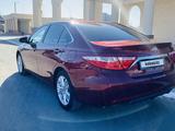 Toyota Camry 2015 года за 8 500 000 тг. в Атырау – фото 4