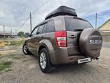 Suzuki Grand Vitara 2012 года за 7 000 000 тг. в Алматы – фото 4