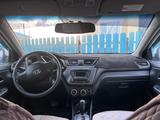 Kia Rio 2011 года за 2 900 000 тг. в Актобе – фото 4