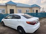 Kia Rio 2011 года за 2 900 000 тг. в Актобе – фото 2