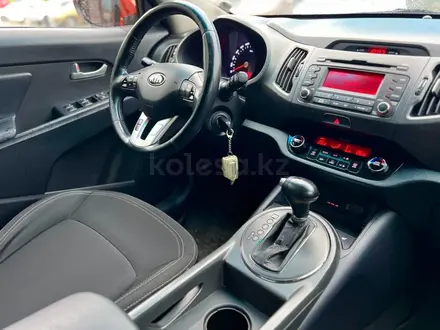 Kia Sportage 2012 года за 6 815 000 тг. в Караганда – фото 18