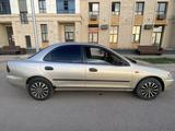 Mazda 323 1996 годаүшін1 650 000 тг. в Караганда