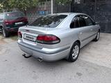 Mazda 626 1999 года за 3 200 000 тг. в Шымкент – фото 4