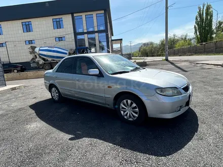 Mazda 323 2000 года за 1 900 000 тг. в Алматы – фото 12