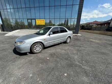 Mazda 323 2000 года за 1 900 000 тг. в Алматы – фото 13