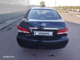 Nissan Almera 2014 года за 3 800 000 тг. в Рудный – фото 2