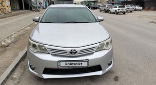 Toyota Camry 2014 года за 6 900 000 тг. в Жанаозен