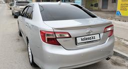 Toyota Camry 2014 года за 6 900 000 тг. в Жанаозен – фото 4