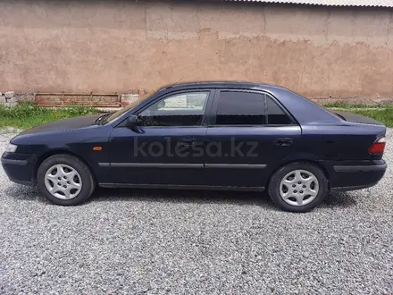 Mazda 626 1998 годаүшін1 850 000 тг. в Шымкент – фото 8