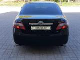 Toyota Camry 2010 года за 7 000 000 тг. в Актобе – фото 2