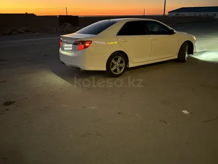 Toyota Camry 2014 года за 6 400 000 тг. в Жанаозен – фото 7