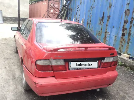 Nissan Primera 1997 года за 1 200 000 тг. в Караганда – фото 2