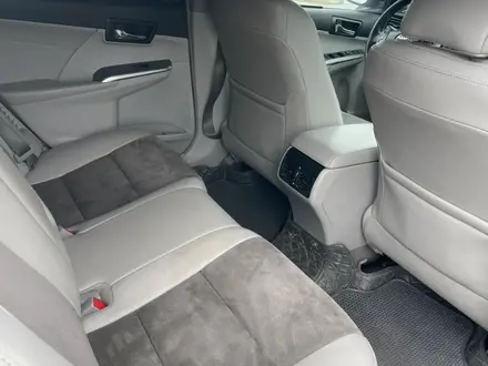 Toyota Camry 2014 года за 5 800 000 тг. в Атырау – фото 23