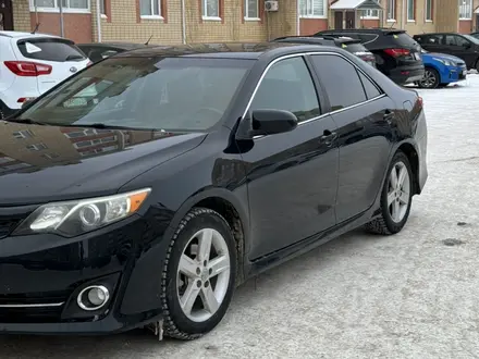 Toyota Camry 2014 года за 8 700 000 тг. в Актобе