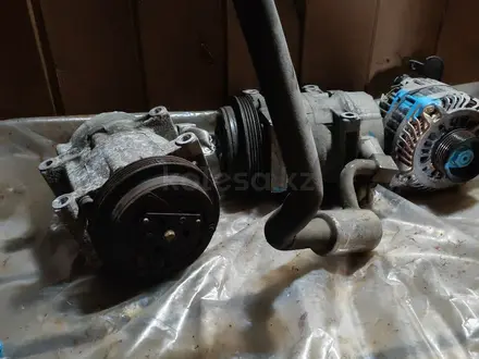 Компрессор кондиционера на Ниссан Эльгранд Е51 за 12 000 тг. в Астана