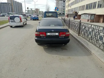 Toyota Carina E 1997 года за 2 100 000 тг. в Астана – фото 3