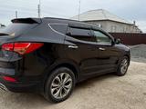 Hyundai Santa Fe 2013 года за 8 800 000 тг. в Атырау – фото 3
