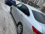 Nissan Almera 2013 года за 3 500 000 тг. в Астана – фото 2