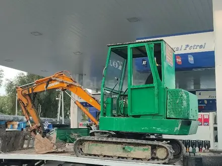 Услуги Экскаватор мини траншейный гусеничный, ямобур, гидромолот в Алматы – фото 5