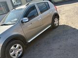 Renault Sandero 2013 года за 2 800 000 тг. в Макинск – фото 2