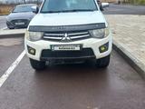 Mitsubishi L200 2011 года за 7 500 000 тг. в Астана