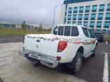 Mitsubishi L200 2011 года за 7 500 000 тг. в Астана – фото 4