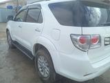 Toyota Fortuner 2011 года за 12 000 000 тг. в Актобе – фото 4