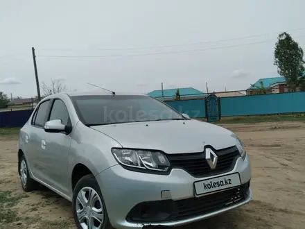 Renault Logan 2014 года за 2 700 000 тг. в Актобе – фото 2