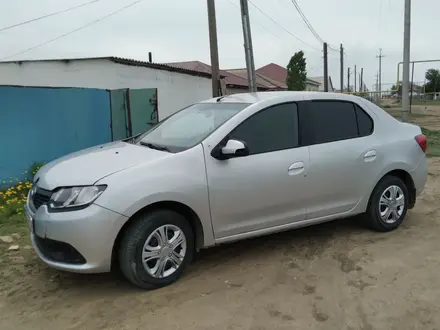 Renault Logan 2014 года за 2 700 000 тг. в Актобе – фото 3