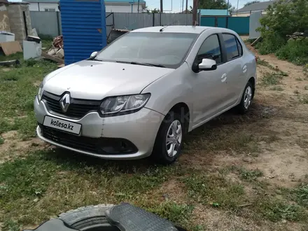 Renault Logan 2014 года за 2 700 000 тг. в Актобе – фото 4