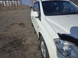 SsangYong Kyron 2012 года за 4 500 000 тг. в Караганда – фото 2