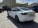 Tesla Model 3 2022 годаүшін18 600 000 тг. в Астана – фото 3