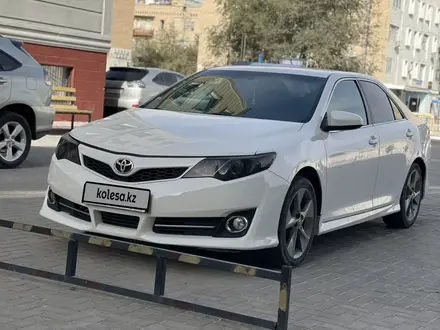 Toyota Camry 2013 года за 7 300 000 тг. в Жанаозен