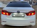 Toyota Camry 2014 года за 10 200 000 тг. в Жанаозен – фото 2