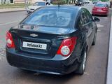 Chevrolet Aveo 2014 года за 3 200 000 тг. в Караганда – фото 4