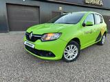 Renault Sandero 2015 годаүшін2 700 000 тг. в Костанай