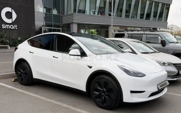 Tesla Model Y 2024 года за 13 850 000 тг. в Алматы