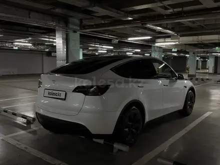 Tesla Model Y 2024 года за 13 850 000 тг. в Алматы – фото 6