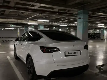 Tesla Model Y 2024 года за 13 850 000 тг. в Алматы – фото 8