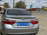 Toyota Camry 2015 года за 6 500 000 тг. в Кульсары – фото 2