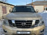 Nissan Patrol 2014 года за 15 000 000 тг. в Астана