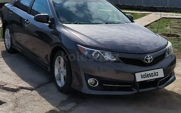 Toyota Camry 2014 года за 8 600 000 тг. в Актобе