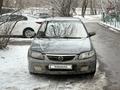Mazda 323 2002 года за 1 800 000 тг. в Алматы – фото 4