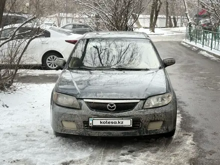 Mazda 323 2002 года за 1 800 000 тг. в Алматы – фото 4