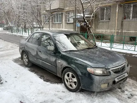 Mazda 323 2002 года за 1 800 000 тг. в Алматы – фото 2